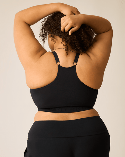 Black Sublime® nursing sports bra by Kindred Bravely, featuring supportive design with adjustable straps and breathable fabric.