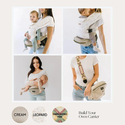 Tushbaby Hip Carrier for baby and toddler in black, with padded straps and ergonomic design for comfortable carrying.