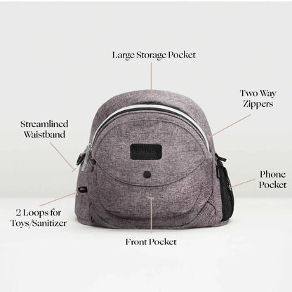 Tushbaby Hip Carrier for babies and toddlers, adjustable infant carrier with padded straps and ergonomic design.