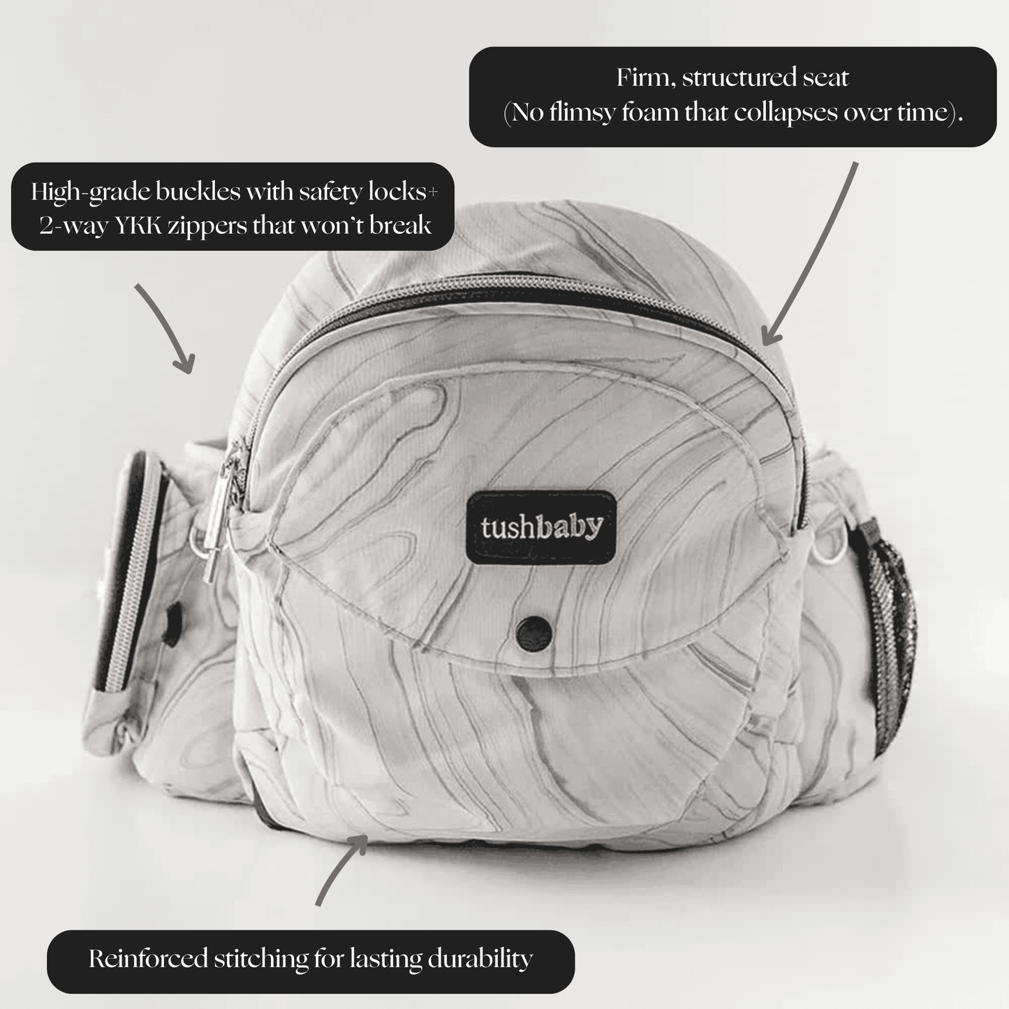 Tushbaby Hip Carrier for babies and toddlers, adjustable ergonomic design with padded straps and supportive waistband.