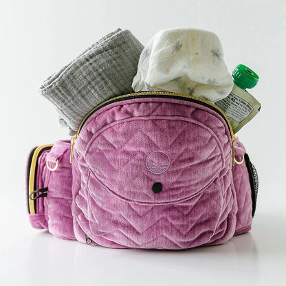 Tushbaby Hip Carrier for babies and toddlers, featuring adjustable straps and supportive waist belt in neutral color.