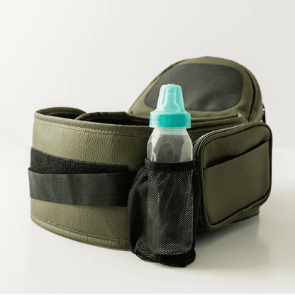 Tushbaby Hip Carrier for babies and toddlers in black, with adjustable straps and ergonomic design for comfortable carry.