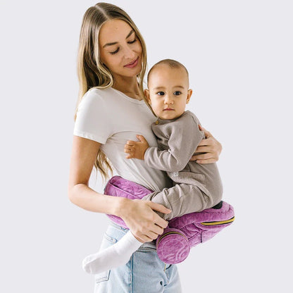 Tushbaby Hip Carrier for babies and toddlers, showing a comfortable, ergonomic design with adjustable straps and supportive waistband.