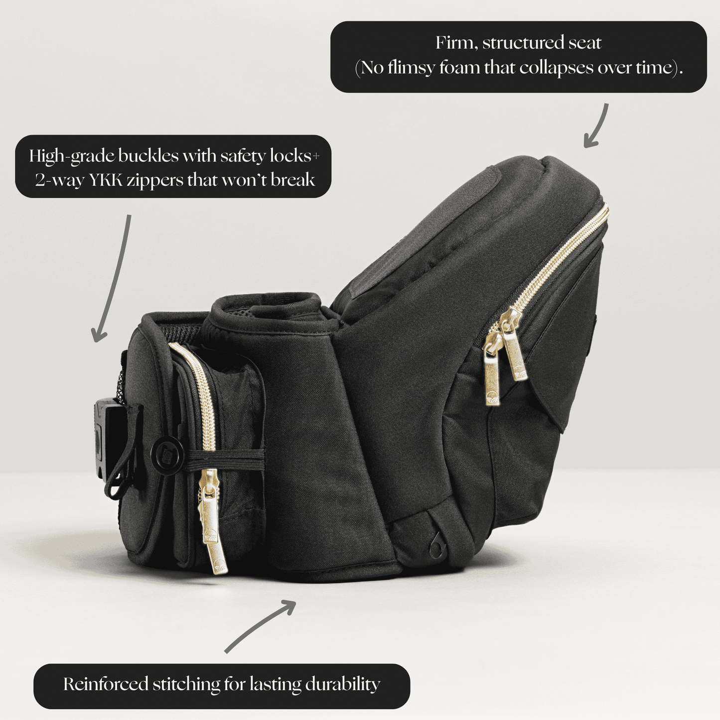 Tushbaby hip carrier for babies and toddlers, beige fabric with adjustable straps and ergonomic design for comfortable carrying.