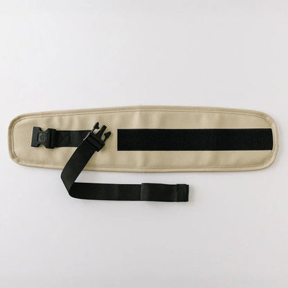 Tushbaby Waistband Extender for Baby & Toddler, adjustable for comfortable fit, shown clipped onto a waistband in the image.