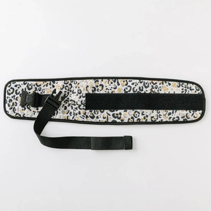 Tushbaby Waistband Extender for Baby & Toddler in neutral color, showing adjustable length and secure fit for comfortable wear