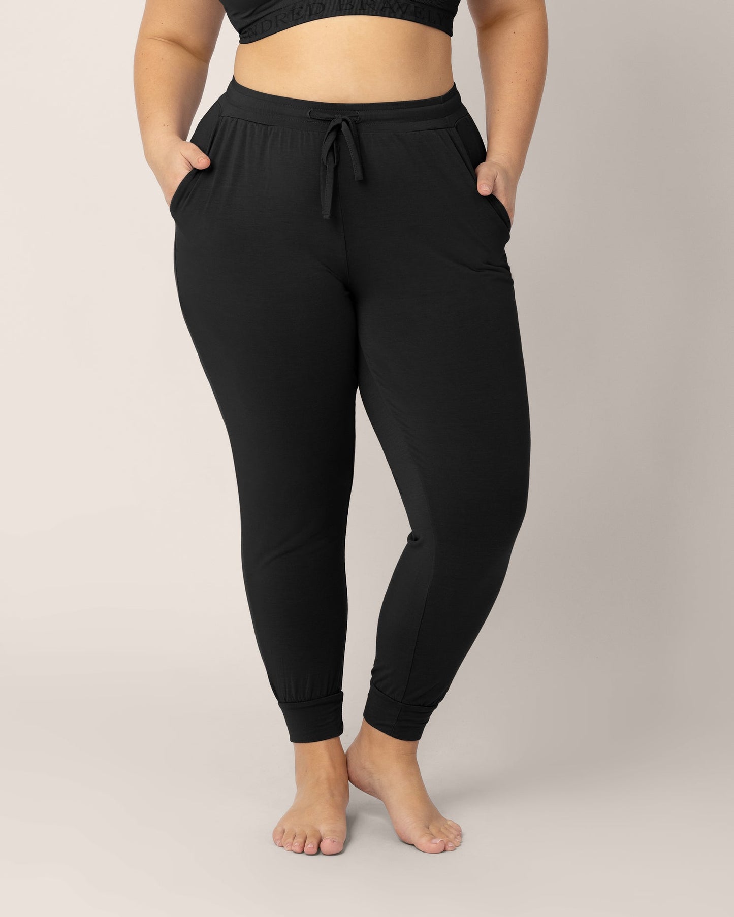 Black Ultralight Sleep and Lounge Jogger bottoms by Kindred Bravely, featuring a relaxed fit and soft fabric for comfortable wear.