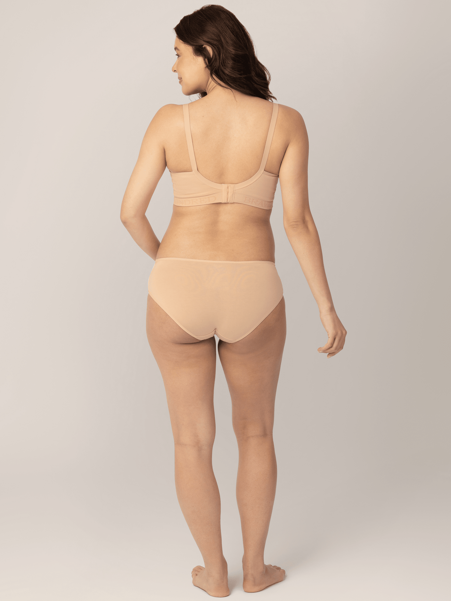 Set of neutral-colored under-the-bump bikini underwear by Kindred Bravely, featuring low-rise style and comfortable fit.
