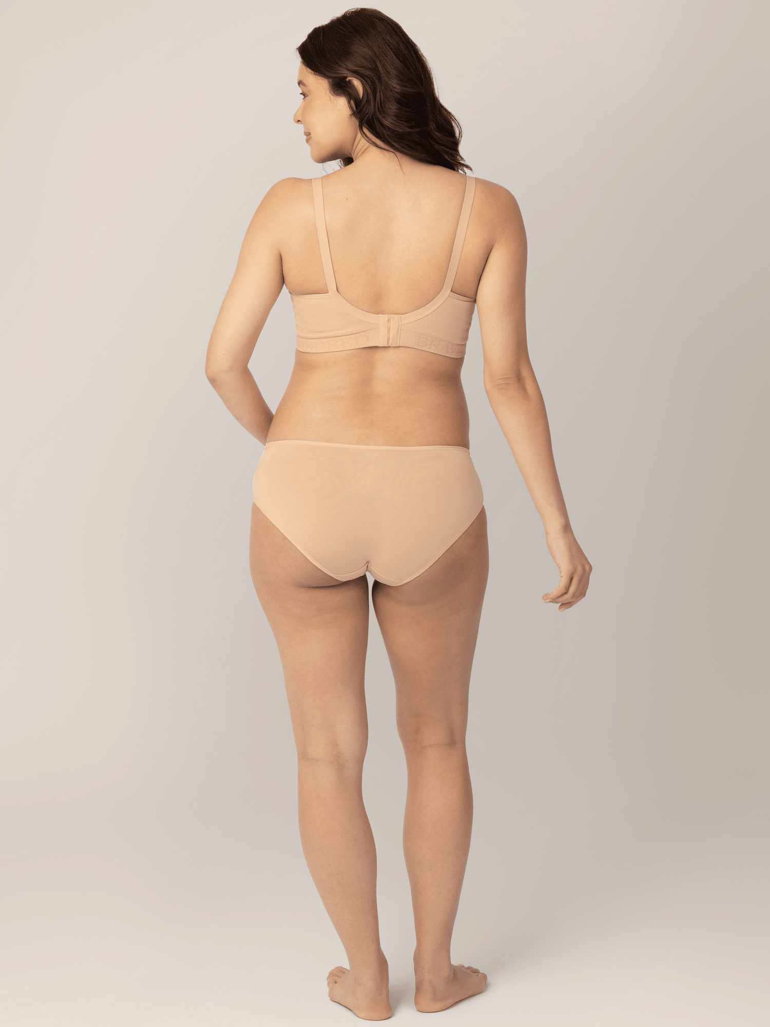 Set of neutral-colored under-the-bump bikini underwear by Kindred Bravely, featuring low-rise style and comfortable fit.