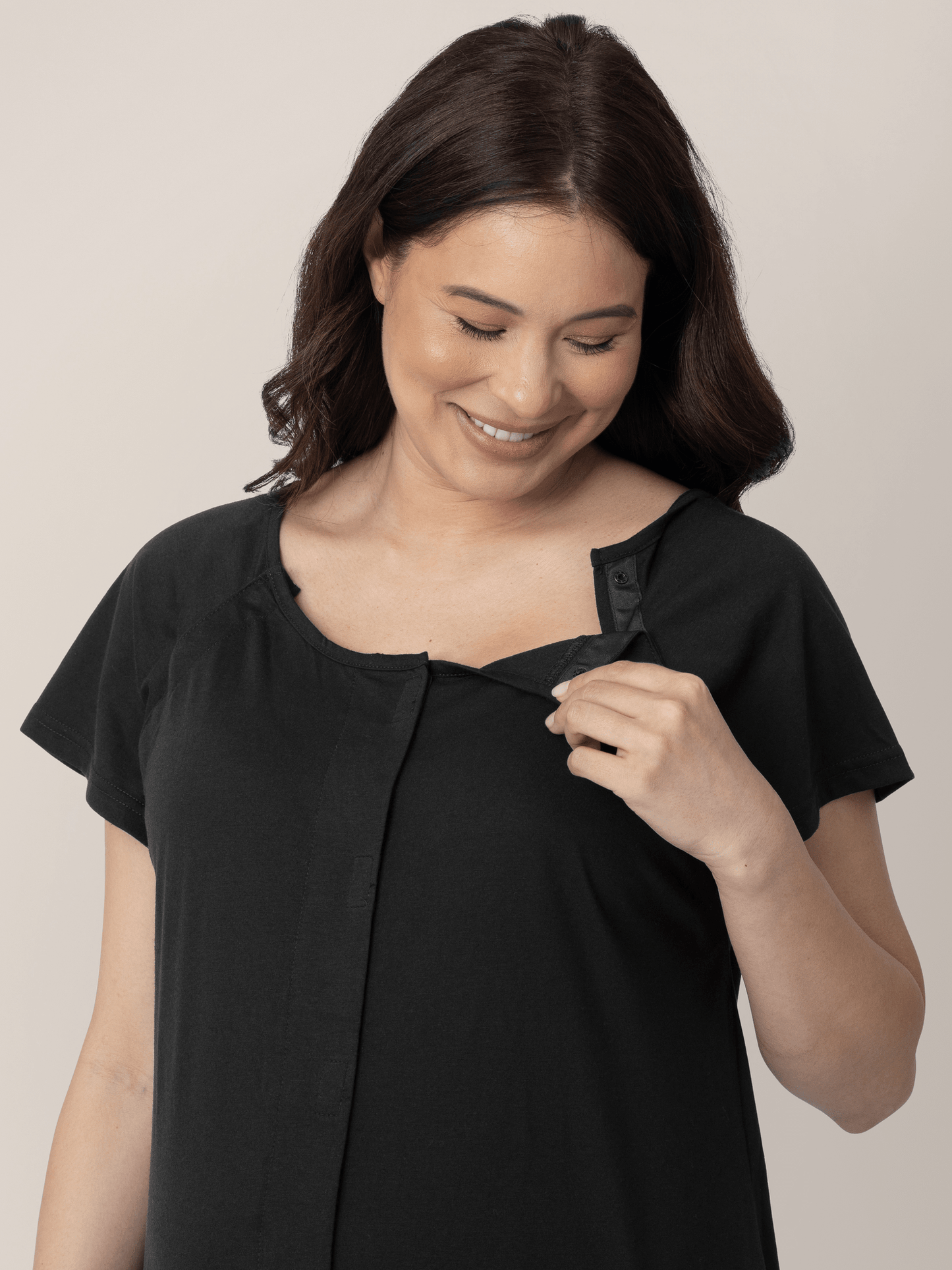 Black universal labor and delivery gown by Kindred Bravely, open-front design with comfortable fabric for postpartum care.