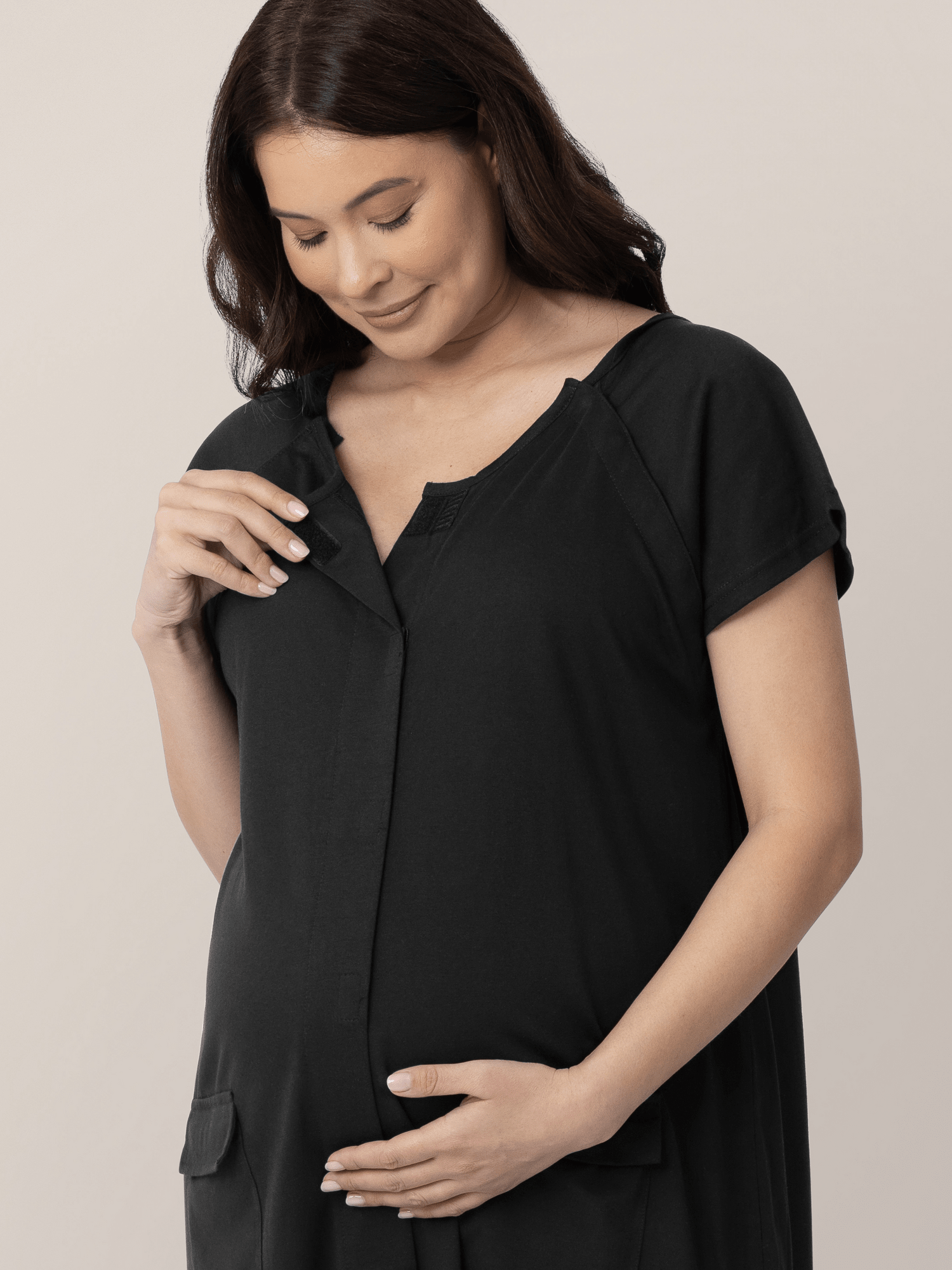 Black universal labor and delivery gown by Kindred Bravely, featuring adjustable ties and comfortable fabric for new mothers.